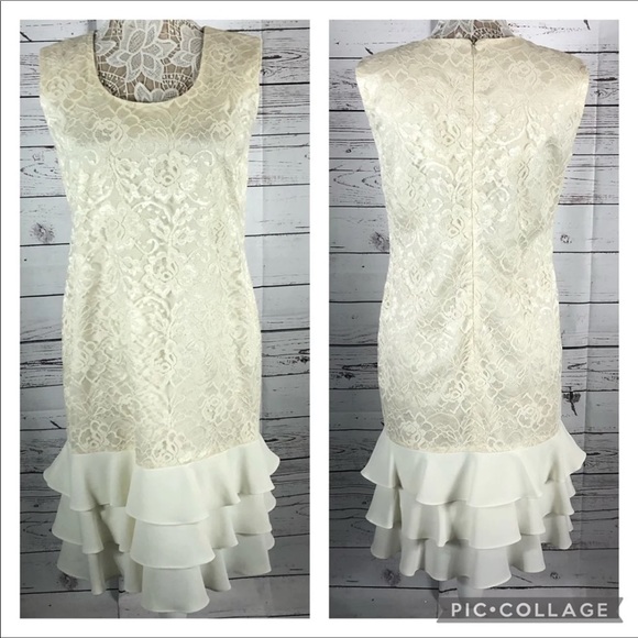 Leslie Fay sleeveless 
Beautiful lace dress with layered ruffles on the end. - Picture 2 of 12
